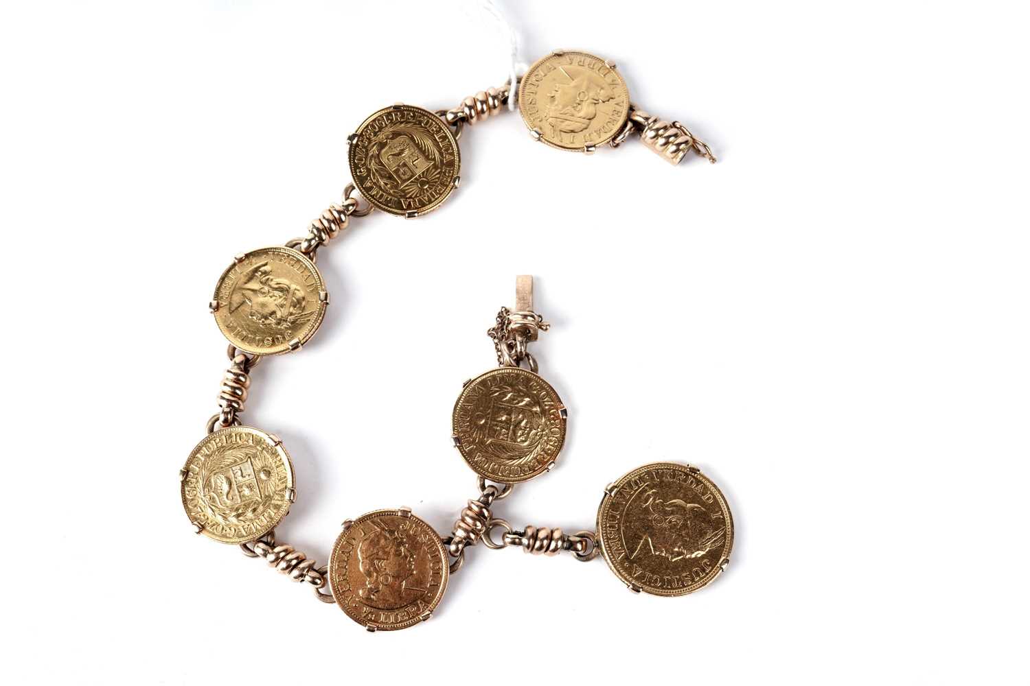 164 - An early 20th Century Peruvian Republica Peruana Lima gold coin bracelet