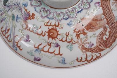 Lot 850 - A pair of Chinese famille rose bowls and covers