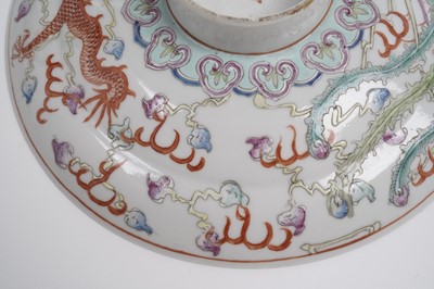 Lot 850 - A pair of Chinese famille rose bowls and covers