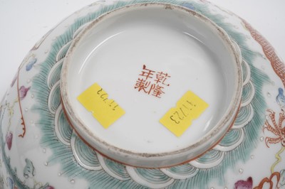Lot 850 - A pair of Chinese famille rose bowls and covers
