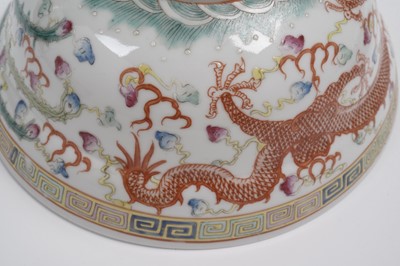 Lot 850 - A pair of Chinese famille rose bowls and covers