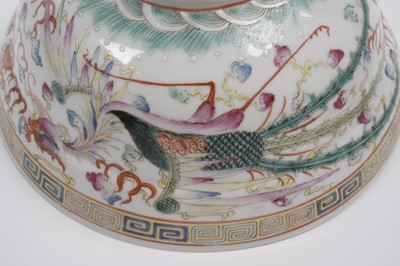 Lot 850 - A pair of Chinese famille rose bowls and covers