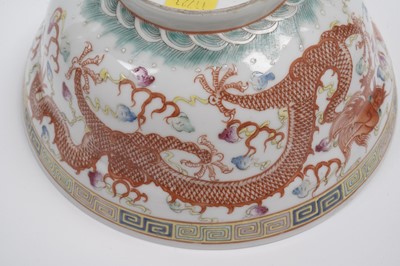Lot 850 - A pair of Chinese famille rose bowls and covers