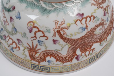 Lot 850 - A pair of Chinese famille rose bowls and covers