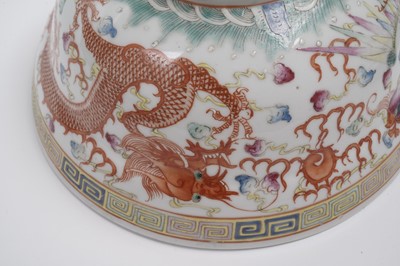Lot 850 - A pair of Chinese famille rose bowls and covers