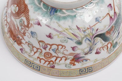Lot 850 - A pair of Chinese famille rose bowls and covers