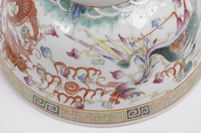 Lot 850 - A pair of Chinese famille rose bowls and covers