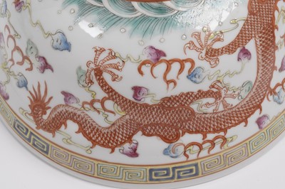 Lot 850 - A pair of Chinese famille rose bowls and covers
