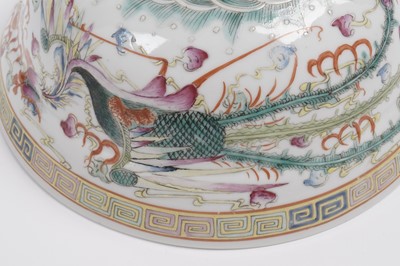 Lot 850 - A pair of Chinese famille rose bowls and covers
