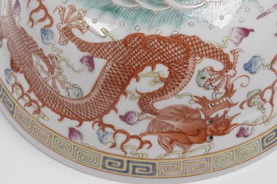 Lot 850 - A pair of Chinese famille rose bowls and covers