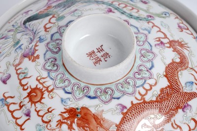Lot 850 - A pair of Chinese famille rose bowls and covers