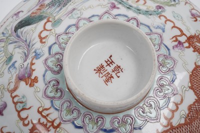 Lot 850 - A pair of Chinese famille rose bowls and covers