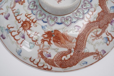Lot 850 - A pair of Chinese famille rose bowls and covers