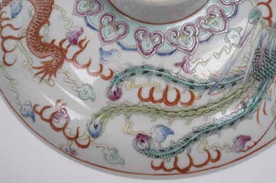 Lot 850 - A pair of Chinese famille rose bowls and covers