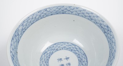 Lot 854 - A Chinese inscribed blue and white bowl
