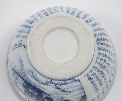 Lot 854 - A Chinese inscribed blue and white bowl