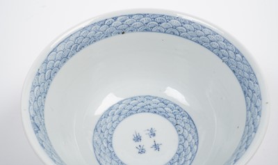 Lot 854 - A Chinese inscribed blue and white bowl