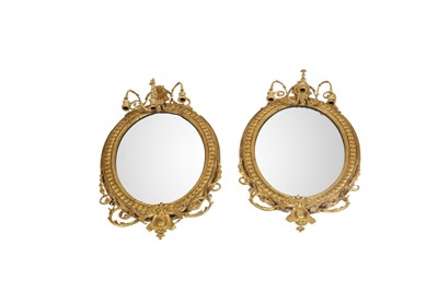Lot 181 - A pair of George III giltwood girandole mirrors