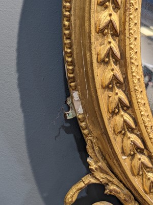 Lot 181 - A pair of George III giltwood girandole mirrors