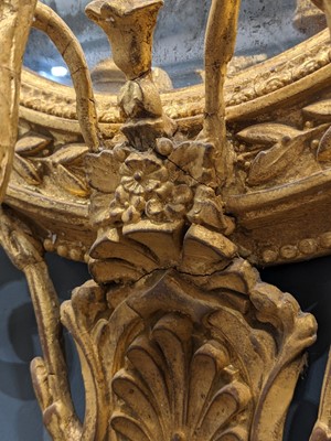 Lot 181 - A pair of George III giltwood girandole mirrors