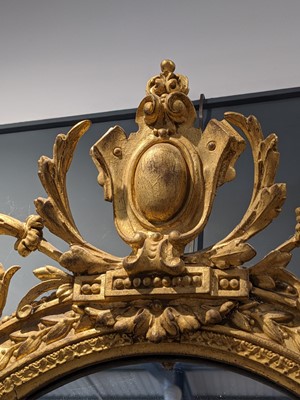 Lot 181 - A pair of George III giltwood girandole mirrors