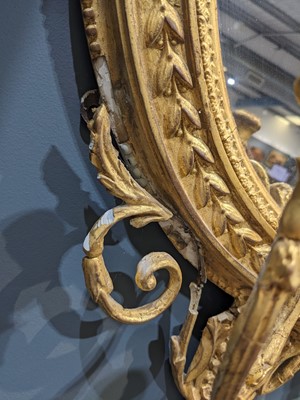 Lot 181 - A pair of George III giltwood girandole mirrors