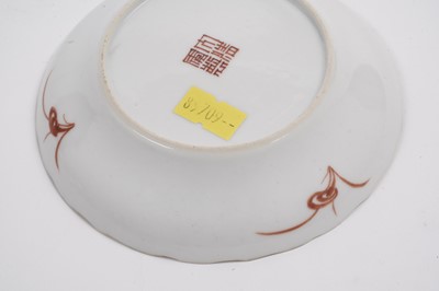 Lot 881 - A Chinese sparrow beak jug; and three saucers