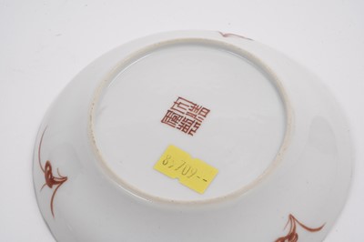 Lot 881 - A Chinese sparrow beak jug; and three saucers