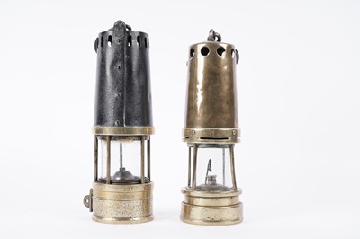Lot 1428 - A ‘Davis deflector’ type lamp; and a brass Marsaut Guys type lamp