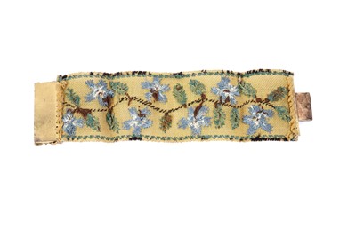 Lot 1490 - A Victorian Romantic Period needlework cuff bracelet