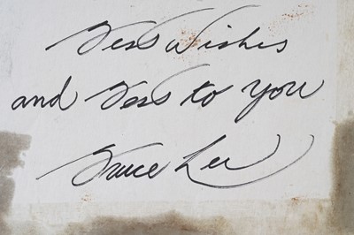 Lot 735 - A Bruce Lee signed and inscribed paper