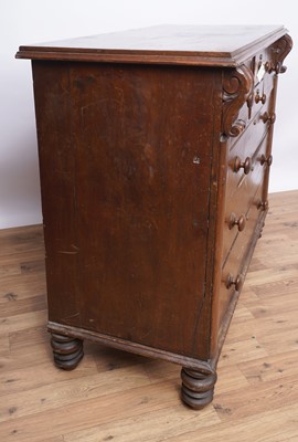 Lot 137 - A Victorian carved walnut chest of drawers