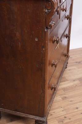 Lot 137 - A Victorian carved walnut chest of drawers