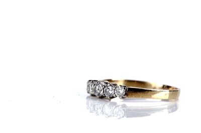 Lot 1 - A diamond five stone ring