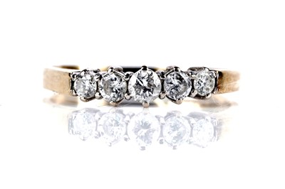 Lot 1 - A diamond five stone ring
