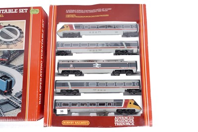 Lot 33 - A Hornby Advanced Passenger Train pack; and an operating turntable set