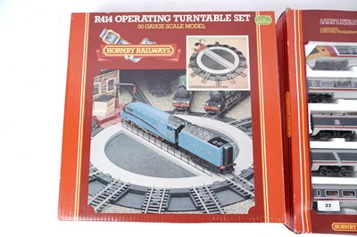 Lot 33 - A Hornby Advanced Passenger Train pack; and an operating turntable set