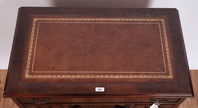 Lot 461 - A substantial Georgian style mahogany kneehole desk