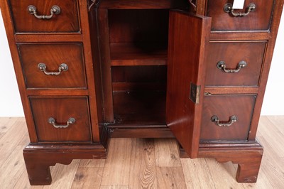 Lot 461 - A substantial Georgian style mahogany kneehole desk