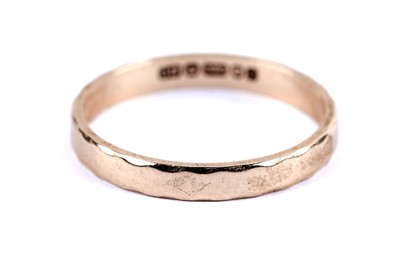 Lot 18 - Two 9ct yellow gold wedding bands; and another yellow gold wedding ring