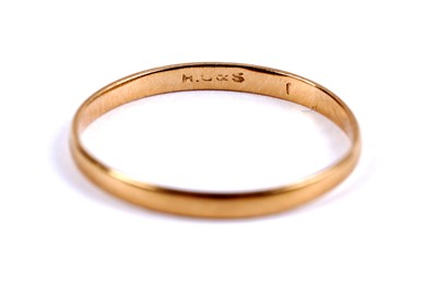 Lot 18 - Two 9ct yellow gold wedding bands; and another yellow gold wedding ring