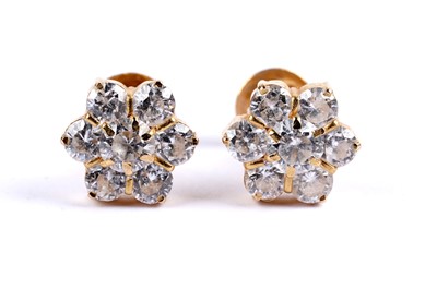 Lot 40 - A pair of Indian white gem stone set flower cluster earrings