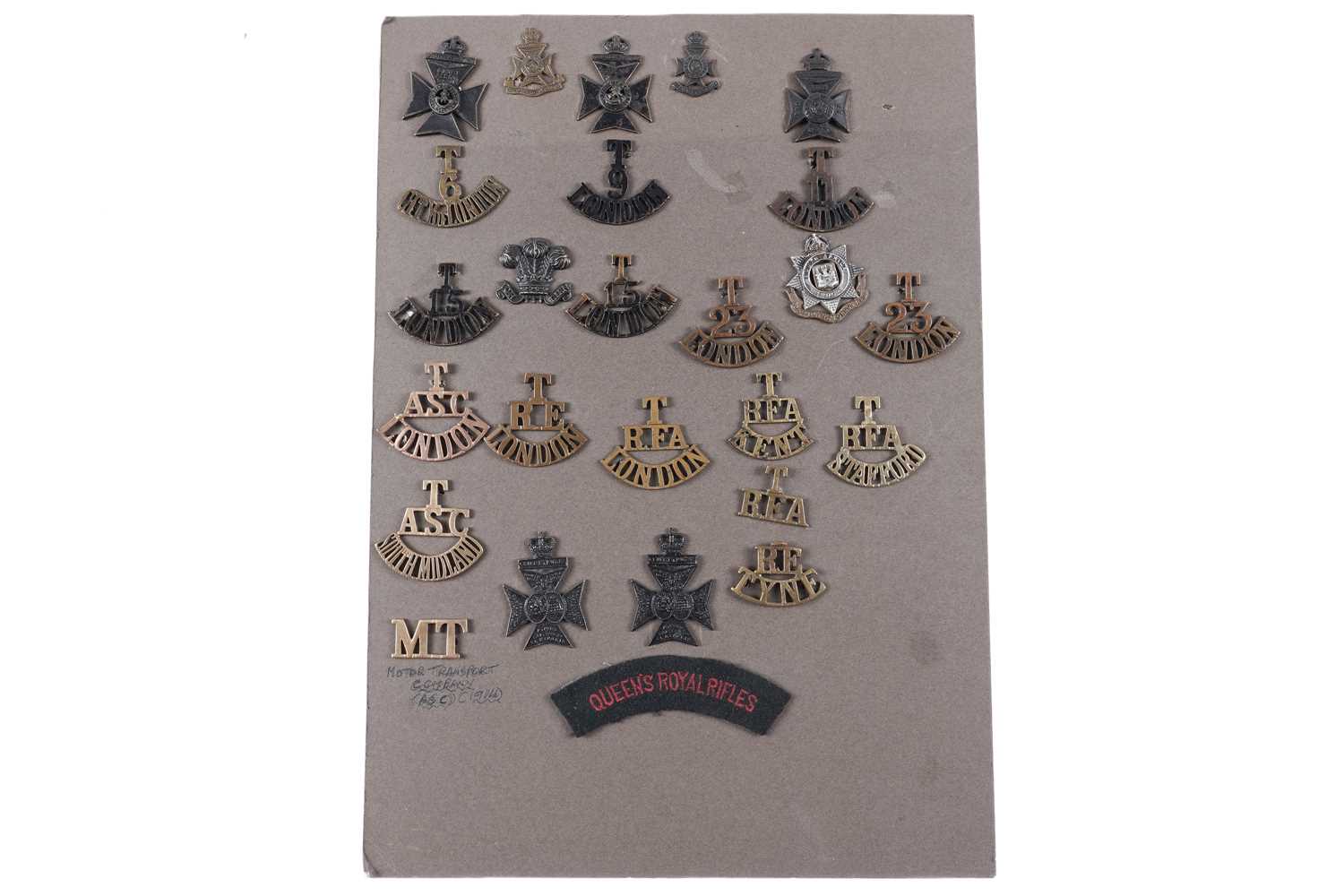 Lot 49 - A display of British Military Territorial title badges
