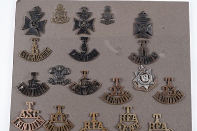 Lot 49 - A display of British Military Territorial title badges