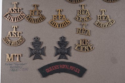 Lot 49 - A display of British Military Territorial title badges