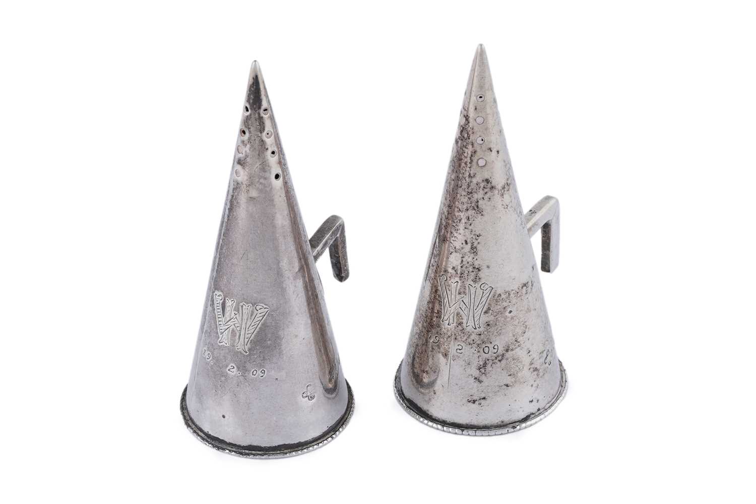 Lot 39 - A pair of late Victorian silver novelty pepper casters