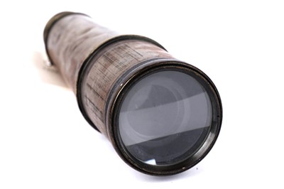 Lot 111 - An early 20th Century four-drawer brass telescope; and a military issue trieder monocle