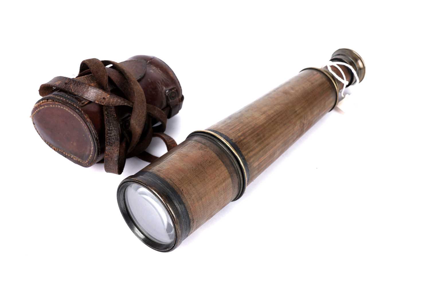 Lot 111 - An early 20th Century four-drawer brass telescope; and a military issue trieder monocle