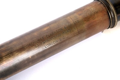 Lot 111 - An early 20th Century four-drawer brass telescope; and a military issue trieder monocle