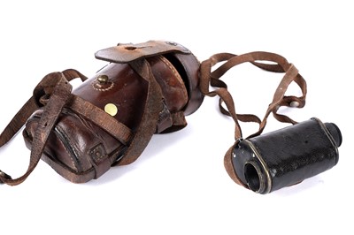 Lot 111 - An early 20th Century four-drawer brass telescope; and a military issue trieder monocle